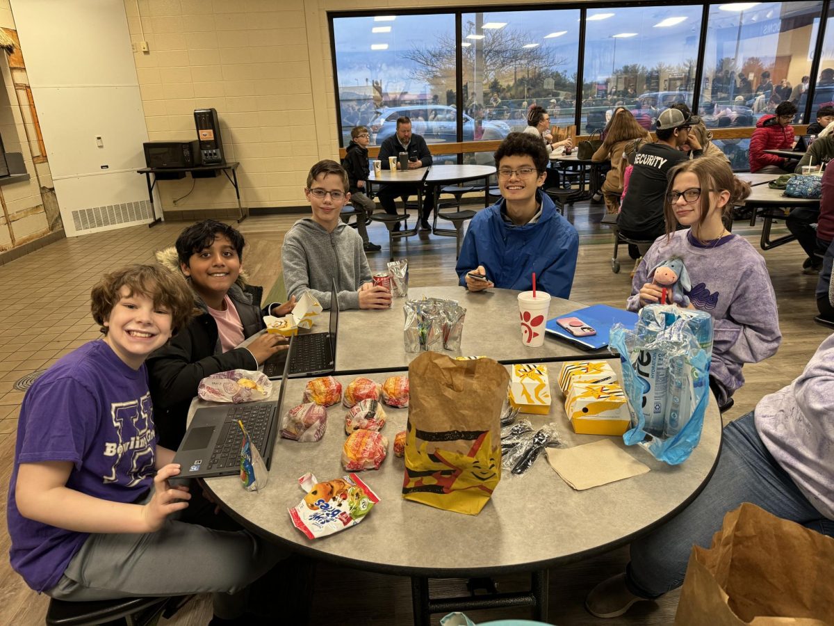 The Academic team enjoys a meal together between a match