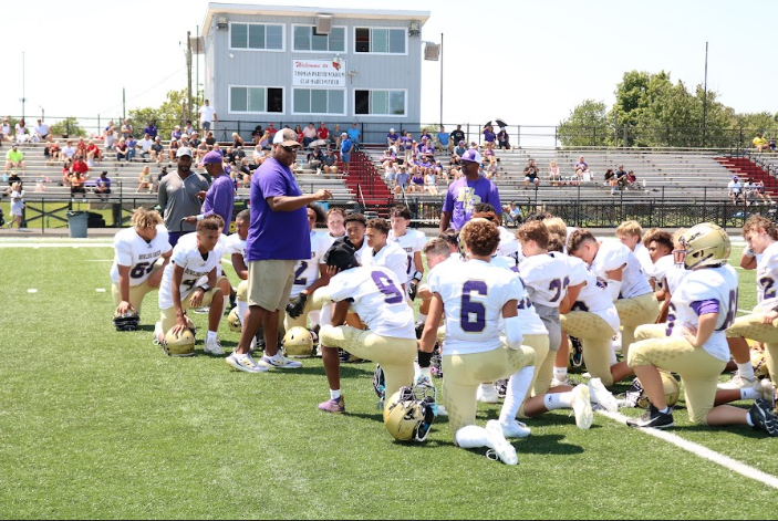 Coach Hayes the head football coach at BGJHS gives the football team a motivational pep talk before their game at Taylor County Middle School on August 10, 2024.