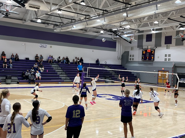 The BGJHS 8th grade volleyball team works together to score a point against Owensboro Monday September, 16th 2024 at Bowling Green Junior High School, giving it their all to add another win to their list!