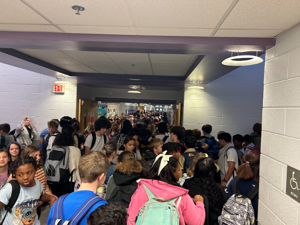 Students at BGJHS rush the hallways to get to class. 