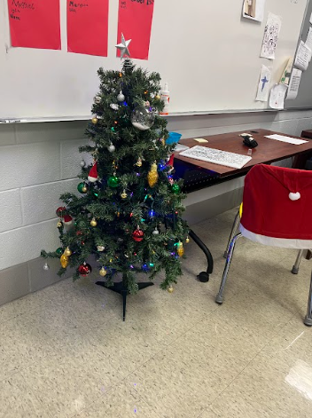 Mr. Otto decorates his room for Christmas before Thanksgiving.