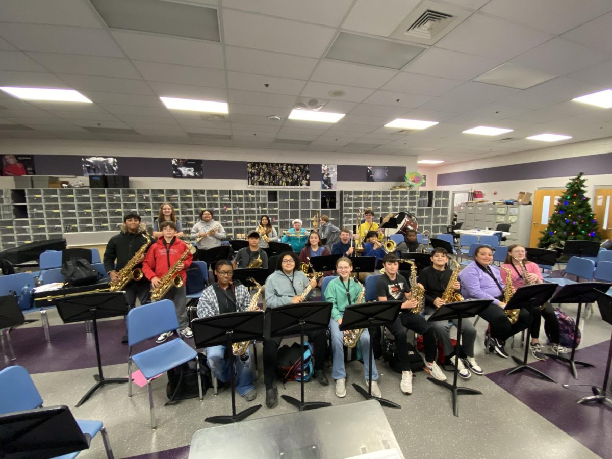 BGJH jazz band students held their instruments and posed in the band room during the 7th period on December 4th.