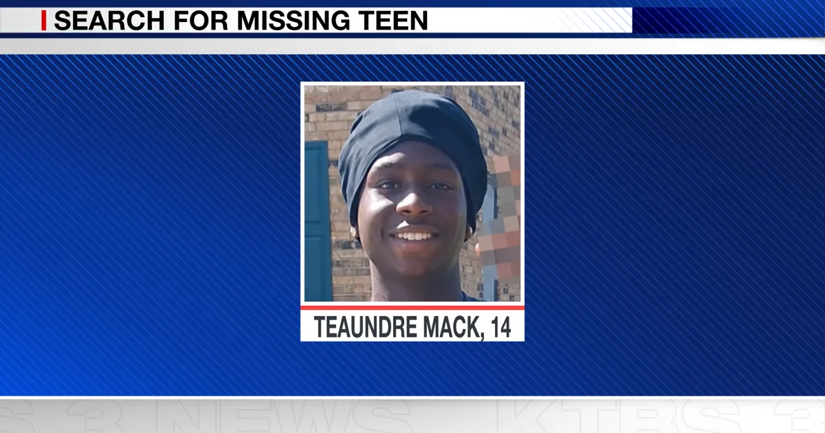 Shreveport police cruiser parked while officers search for a missing teenager