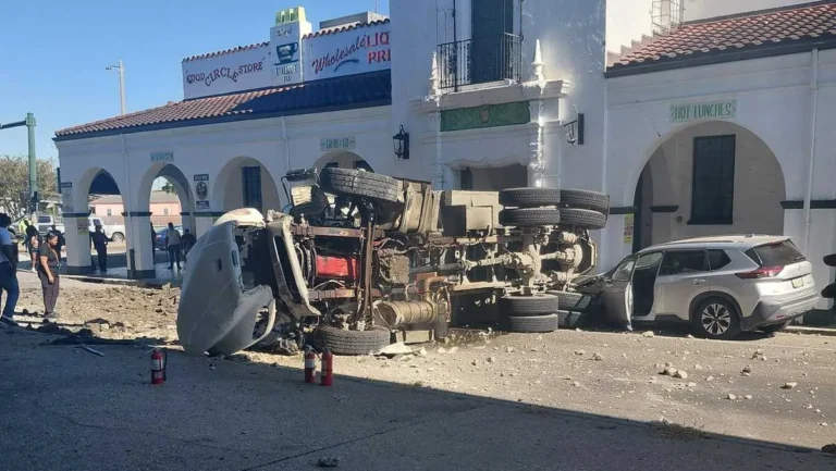 Dump truck crashed off an Interstate 10 bridge in New Orleans with debris on the street below