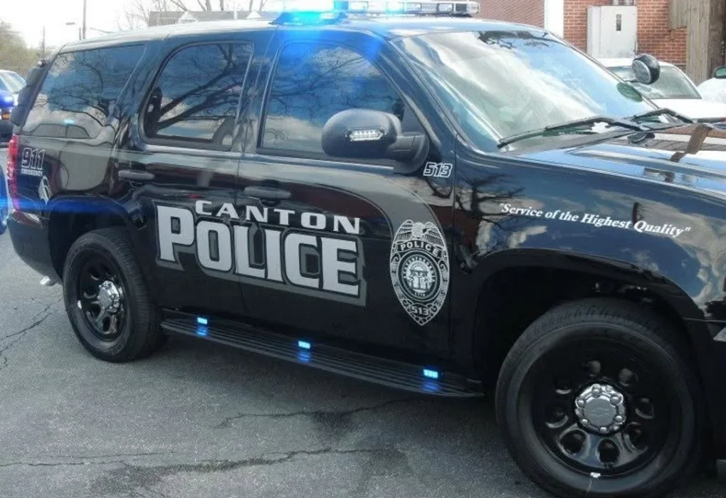 Police response outside a Georgia school area after an alleged shooting plot investigation