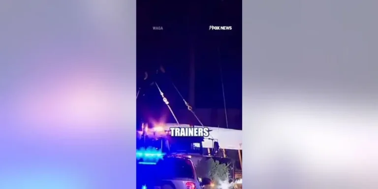 An overturned school bus on a highway after a crash in Georgia