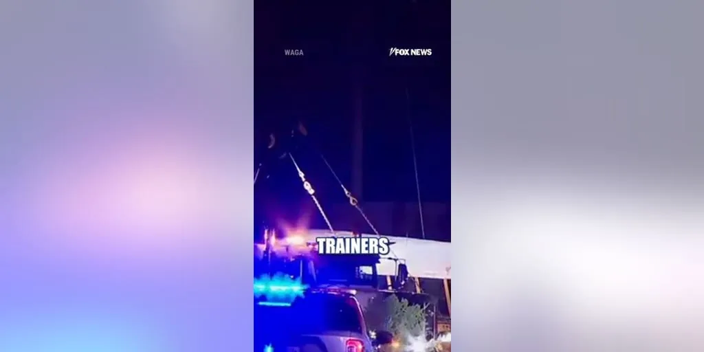 An overturned school bus on a highway after a crash in Georgia