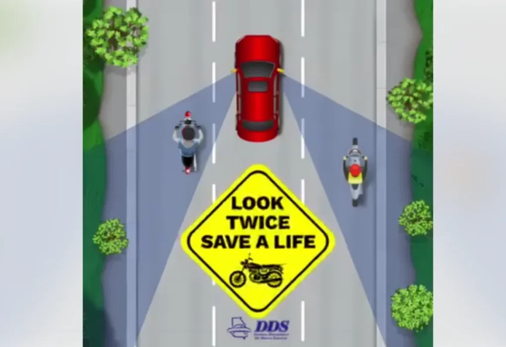 Motorcyclist riding on a Georgia roadway as safety officials urge drivers to look twice